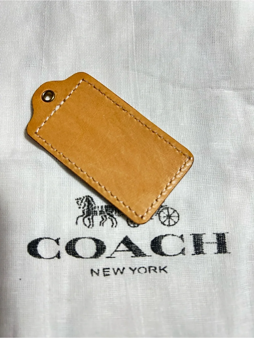 Coach Leather Bag Tags in Cream and Tan